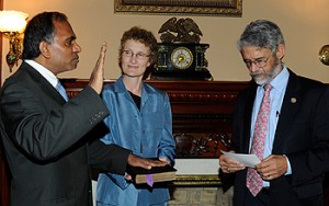 Subra Suresh is sworn in as NSF director in a ceremony at the Eisenhower Executive Office Building in Washington, DC. John P. Holdren, White House science advisor and director of the White House Office of Science and Technology Policy, administers the oath while Suresh's wife, Mary, looks on.