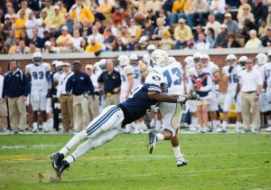 Ansah tackles Georgia Tech quarterback in 2012 game. [Photo Credit BYU Athletics]