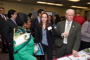 Genevera Allen discusses her poster with Rep. Jackson Lee (D-TX) and Rep. Jerry McNerney (D-CA).