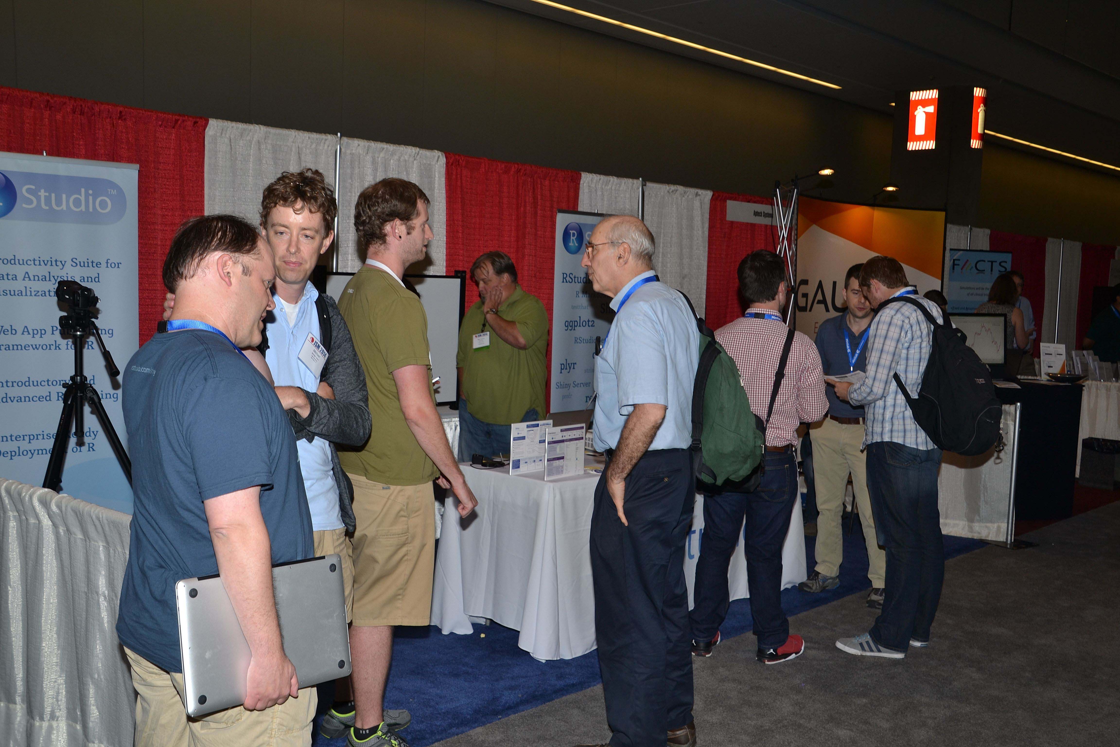 A group of attendees checks out the exhibit hall