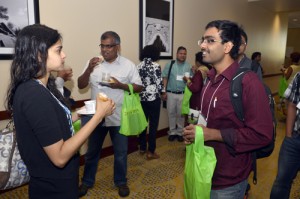 Naveen Narisetty of the University of Michigan (right) shares his thoughts with Chaitra Nagaraja of Fordham University.