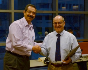 ASA San Antonio Chapter vice president, Jesús Cuéllar Fuentes, presents the 2014 Don Owen Award to Peter Thall.