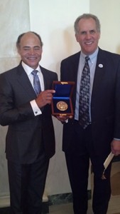 Hugo Blackwell (David Blackwell’s son) displays David Blackwell’s National Medal of Science with ASA Past President Nathaniel Schenker.