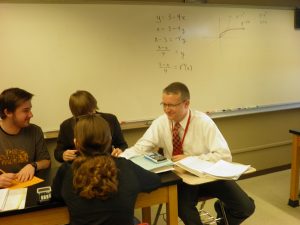 Shelby Aaberg teaches some of his students. Photo by Melissa Price