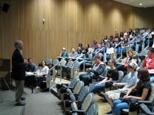 Daniel Hollas, senior associate dean of The University of Texas at San Antonio College of Business, gives a welcome speech to the students who attended Statistics Career Day on March 5.