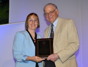 ASA President Jessica Utts presents a plaque to 2016 lecturer, Vincent Barabba, at JSM in Chicago, Illinois.