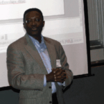 Isaac Nuamah, the current president of the Princeton-Trenton Chapter, speaks to students about becoming statisticians.