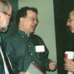 From right: Speakers Alan Shuldiner, Sholom Wacholder, and Knut Wittkowski talk after the AAAS symposium.