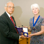 Valerie Isham, president of the Royal Statistical Society (right), presents the Guy Medal in Gold to Calyampudi Radhakrishna Rao on June 29.