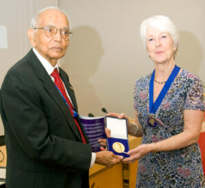 Valerie Isham, president of the Royal Statistical Society (right), presents the Guy Medal in Gold to Calyampudi Radhakrishna Rao on June 29.