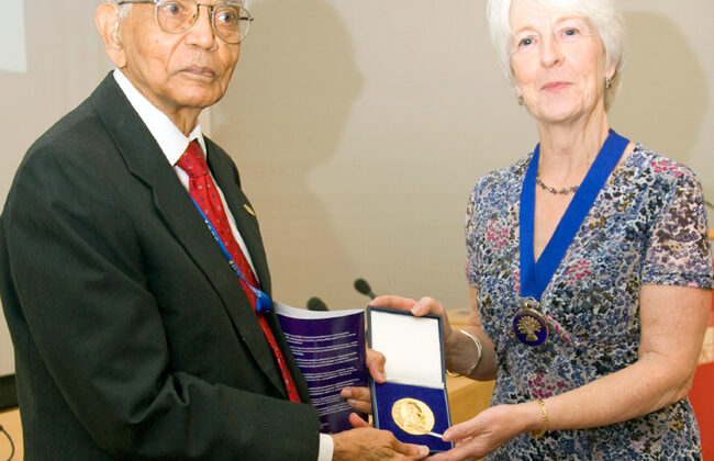 Valerie Isham, president of the Royal Statistical Society (right), presents the Guy Medal in Gold to Calyampudi Radhakrishna Rao on June 29.