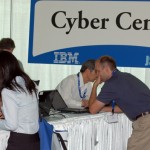JSM attendees using the Cyber Center computers to check email and send messages.