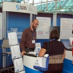 Attendees at the SAS booth at the JSM Expo at the San Diego Convention Center.
