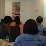MWM program chair Katherine Halvorsen addresses workshop participants.