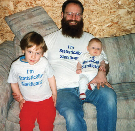 Ronald P. Barry with his children, Eli Barry-Garland (left) and Maura Barry-Garland (right). The picture was published in the Marketplace in Amstat News sometime between 1994–1996.