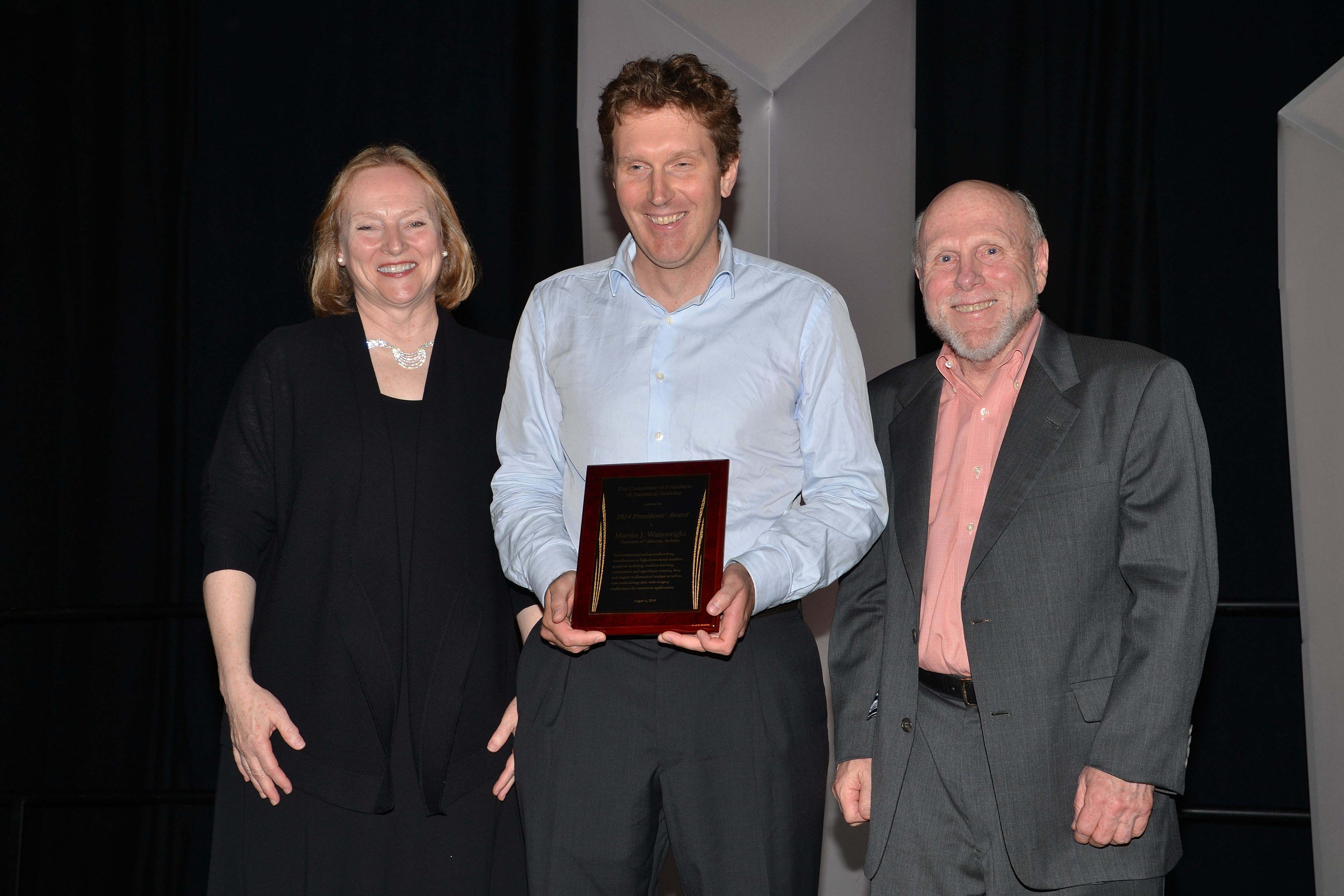 From left: Jane Pendergast, 2014 COPSS Presidents' Award winner Martin Wainwright, and Ray Carroll