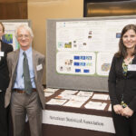 From left: SAMSI collaborator Jessi Cisewski of Carnegie Mellon University, SAMSI Director Richard Smith, and SAMSI postdoc Kimberly Kaufeld stand in front of the ASA’s poster during the Capitol Hill Exhibition of the Coalition for National Science Funding.