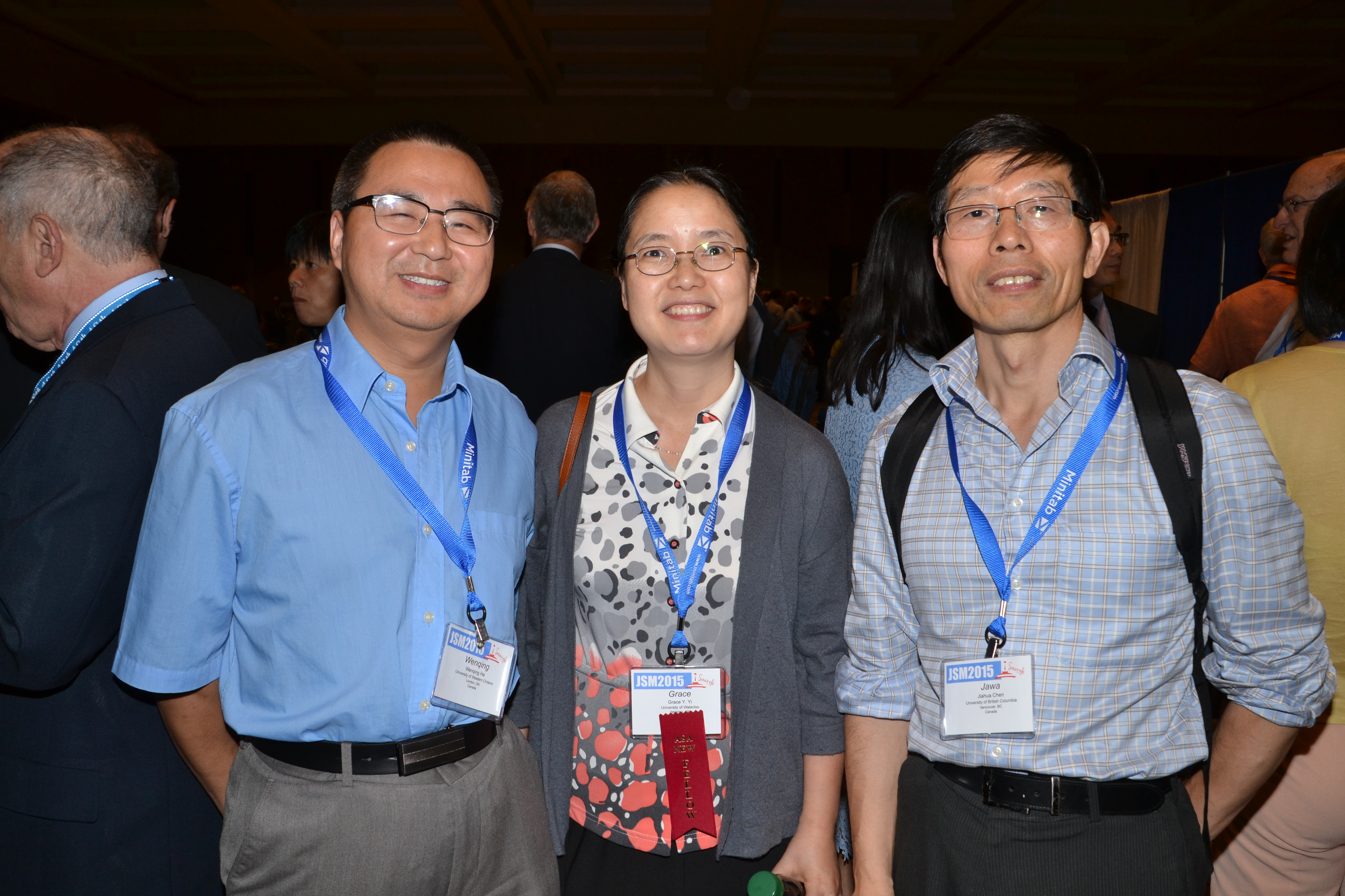 Wenqing He, Grace Yi, and Jawa Chen attend the Fellows reception. 