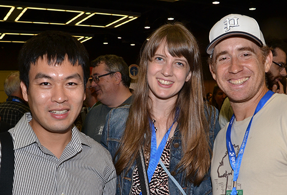 Yong Chen, Hilary Parker, and  Gabriel Chandler attend the Opening Mixer.