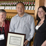 Jun S. Liu (center), winner of the 2017 Jerome Sacks Award, is flanked by NISS Board Chair Mary Batcher (left) and NISS Director (DC office) Nell Sedransk. Photo by Greg Dohler