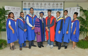 Masters students (from left) with Winston Richards, professor emeritus at The Pennsylvania State University: Danielle Samuell-Seeraj, Anthony Ramdeen, Ravi Ramcharitar, Winston A. Richards, Isaac Dialsingh, Rafael Guerrero, Brendon Bhagwandeen, and Anna-Keren McMayo 