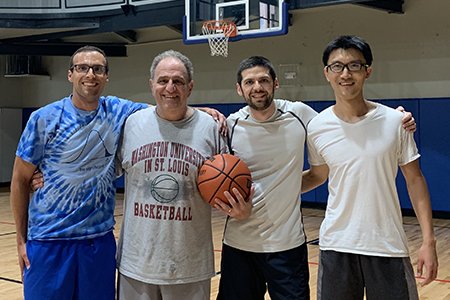 This is the seventh year in which statisticians have gotten together for a pick-up basketball game during JSM. From left: Ryan Tibshirani of Carnegie Mellon, Rob Tibshirani of Stanford, Daniel McDonald of Indiana University, and Dave Zhao of the University of Illinois at Urbana-Champaign