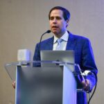 Photo by Olivia Brown/ASA Daniel Polsky of The Johns Hopkins University delivers the opening plenary address, titled “Closing the Gap Between Research and Policy,” at ICHPS.