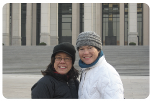 Mulrow and her sister, Cathy Grace, in front of the National Museum of China just outside the Forbidden City
