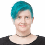 Short, teal hair, slight smile, bright blue eyes.