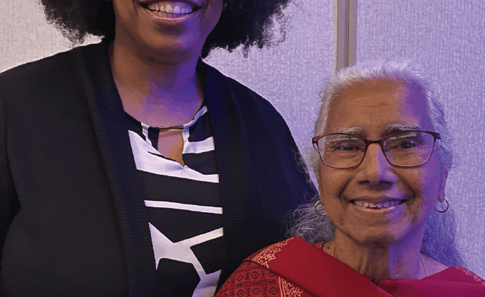 Kimberly Sellers (left) congratulates Nagambal Shah, who received a standing ovation during the AAAS Awards Ceremony that took place in early March during the AAAS meetings in Washington, DC.