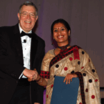Mukherjee accepts the Fellows Award from 2012 ASA President Bob Rodriguez at the Joint Statistical Meetings in San Diego, California.