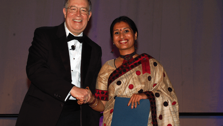 Mukherjee accepts the Fellows Award from 2012 ASA President Bob Rodriguez at the Joint Statistical Meetings in San Diego, California.