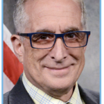 Glasses, big smile, white man