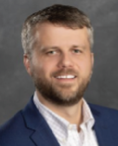 Beard, mustache, big smile, suit jacket, no tie