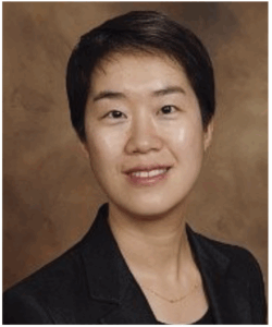 Portrait of Cao, woman, short hair, kind eyes