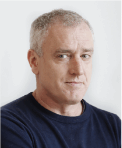 Portrait of Murphy, male, short hair, no collar shirt