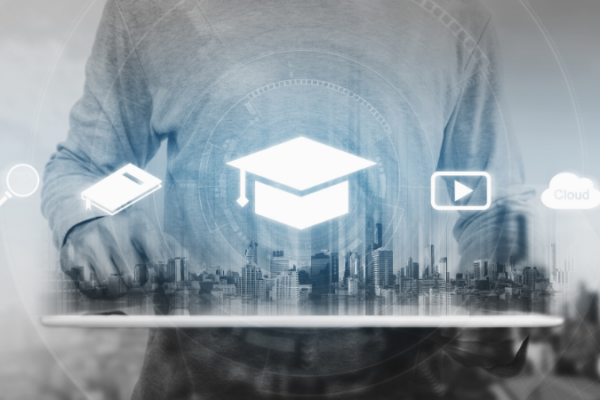 Educational symbols over a cityscape and a man's shirt