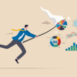 a man in a suit chases graphc with a net
