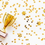Trophy with gold glitter around it