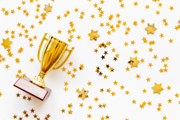 Trophy with gold glitter around it