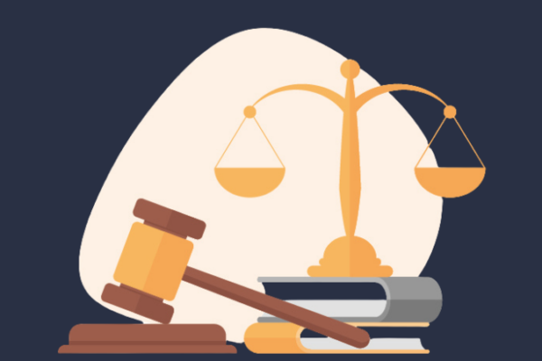 Gavel and a set of scales hanging from a center beam