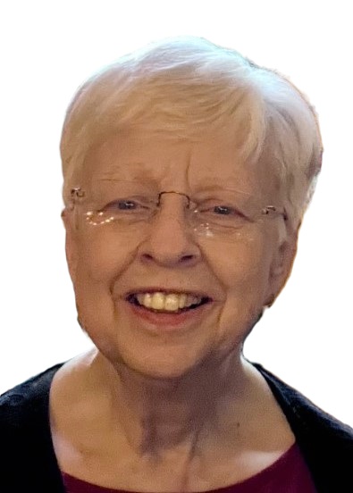 Connie Citro has a white pixie cut and is wearing a black shirt and glasses.